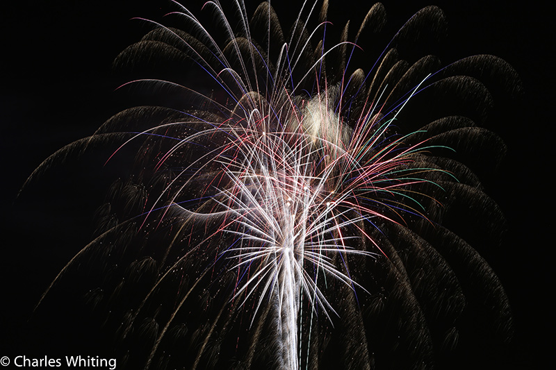 Fireworks light the night sky over LoDo Denver on Independence Day 2012