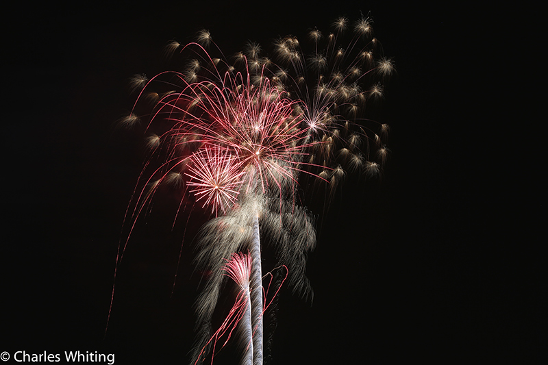 Fireworks light the night sky over LoDo Denver on Independence Day 2012