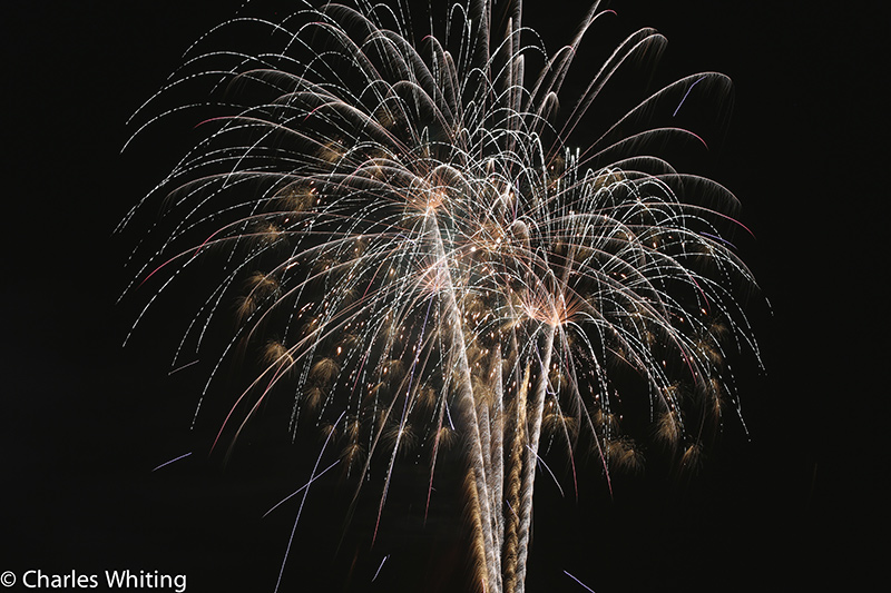 Fireworks light the night sky over LoDo Denver on Independence Day 2012