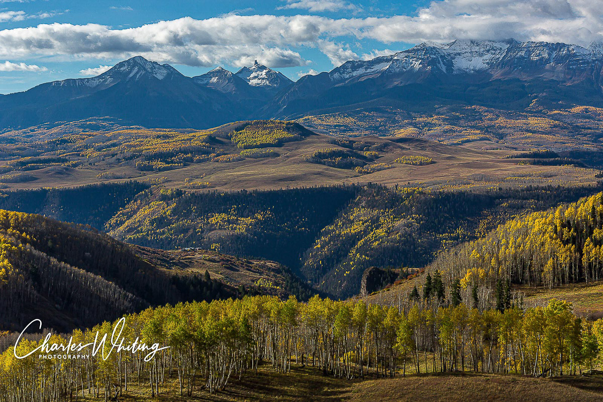 Lizard Head Peak, a 13,000 foot volcanic pinnacle in the upper middle of the frame, is considered Colorado's hardest peak to...
