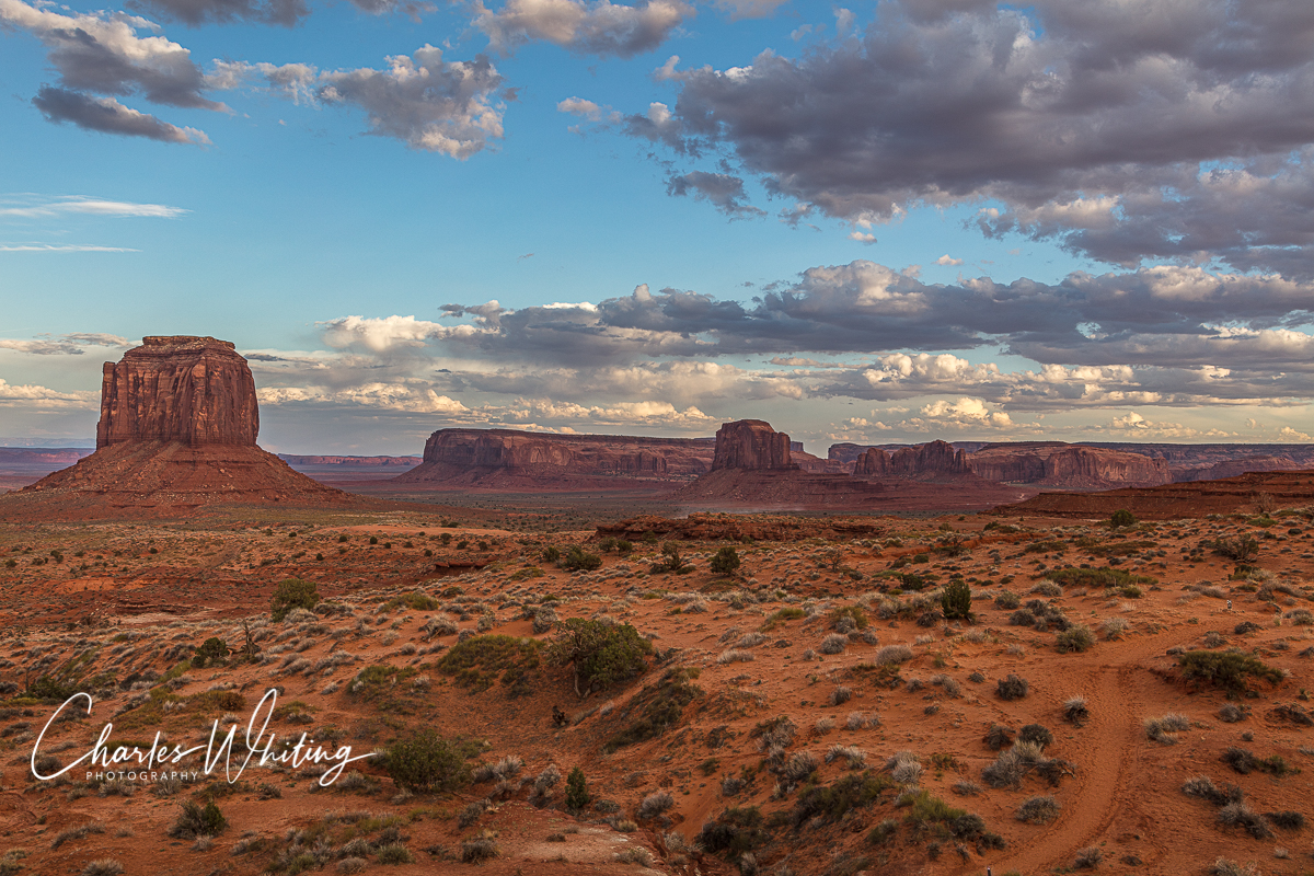 Merrick Butte (left) at sunset. The buttes to the right include: Elephant Butte, Cly Butte, and Rain God Mesa